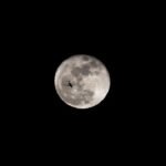Full moon and stars in the night sky