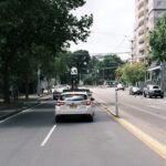 Autonomous car driving down a city street