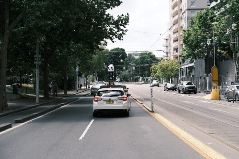 Autonomous car driving down a city street